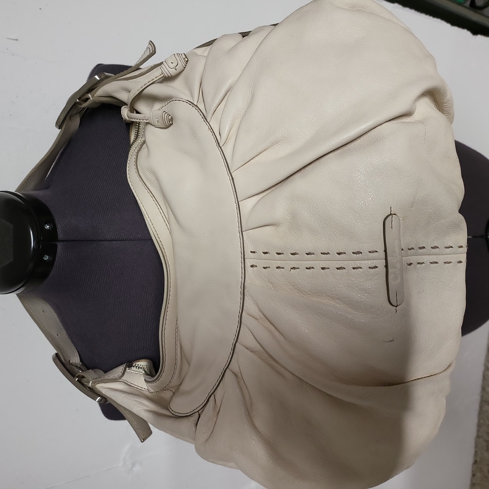 Cole Haan, bone colored leather bag. New condition.